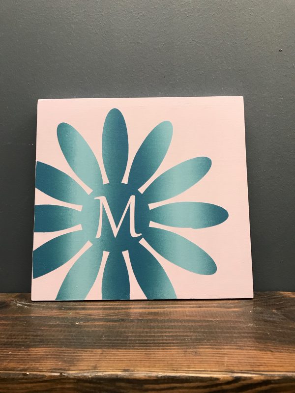 flower monogram and initial on wood