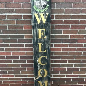 welcome with leaves on wood sign