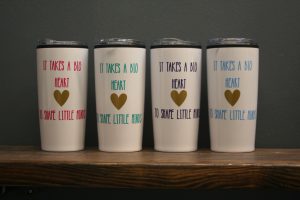 Coffee mugs that say "It takes a big heart to shape a little mind"