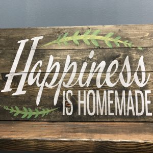 happiness is homemade on wood paneling