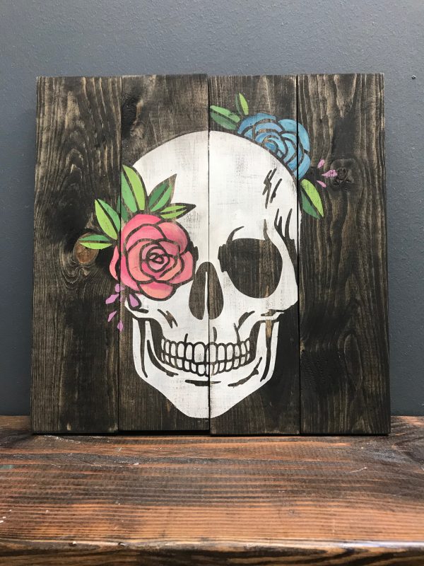 flower skull on wood paneling